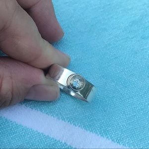 Silver and white topaz thick band ring